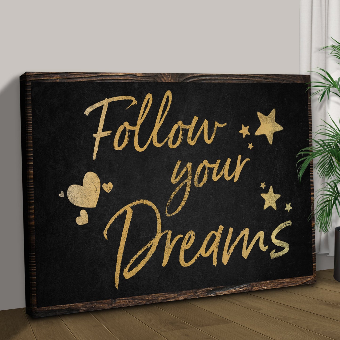 Follow Your Dreams Sign II canvas with gold script on black background and wood frame on Tampa Home & Garden Store