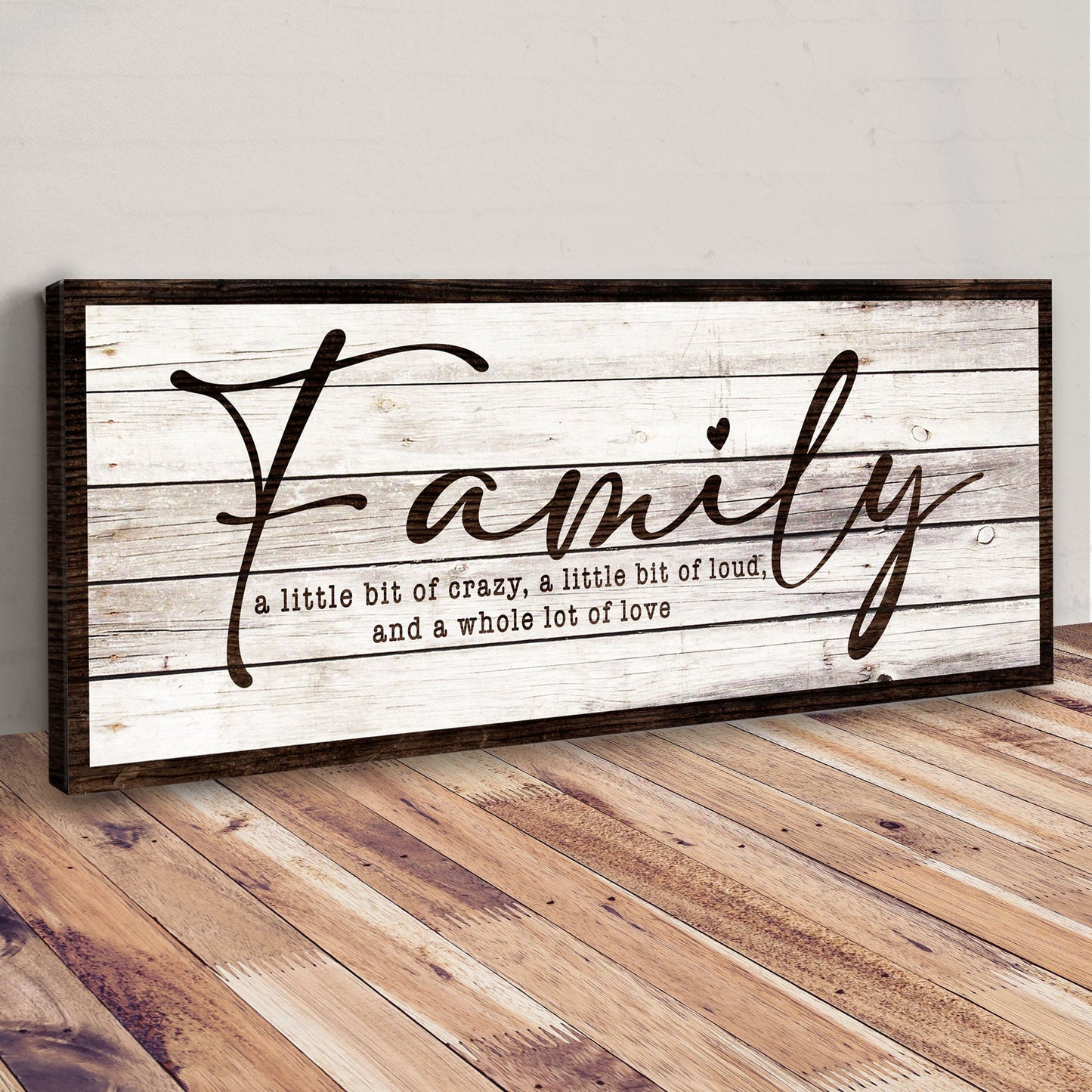 Canvas A Little Bit Of Crazy, Loud, And A Whole Lot Of Love Family Sign III framed in dark wood on Tampa Home & Garden Store