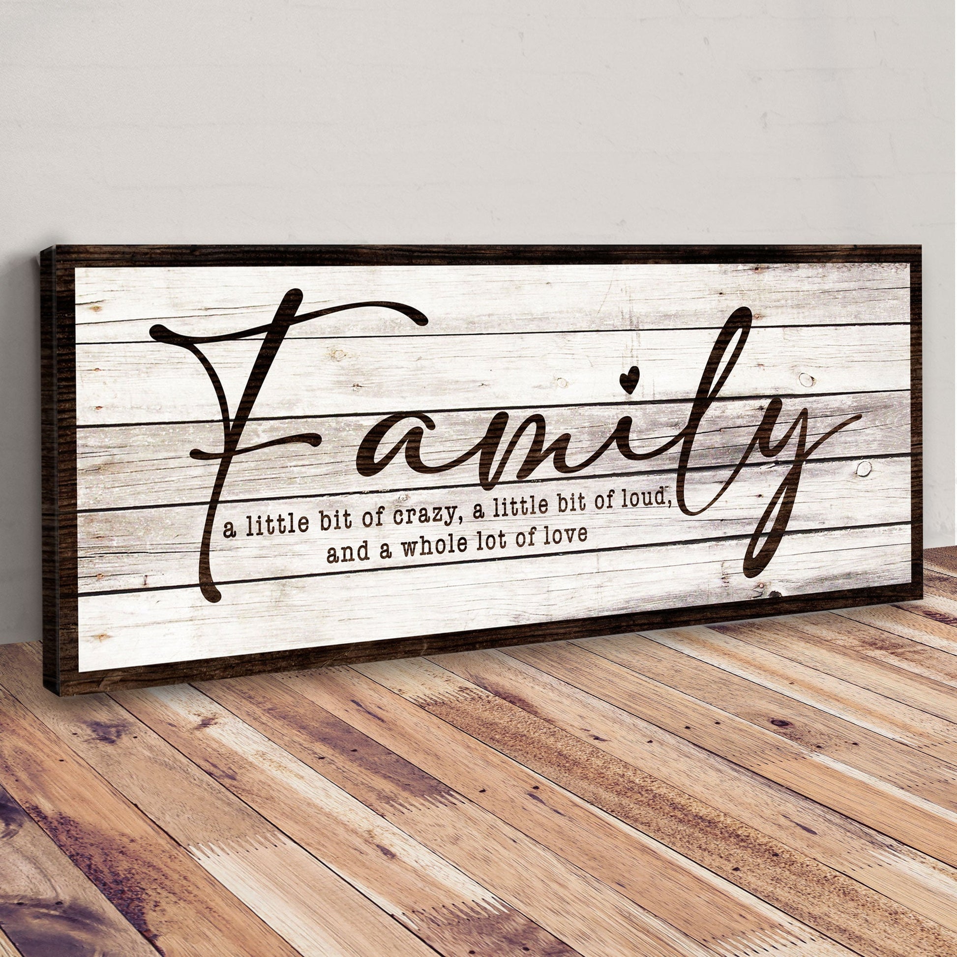 Canvas A Little Bit Of Crazy, Loud, And A Whole Lot Of Love Family Sign III framed in dark wood on Tampa Home & Garden Store