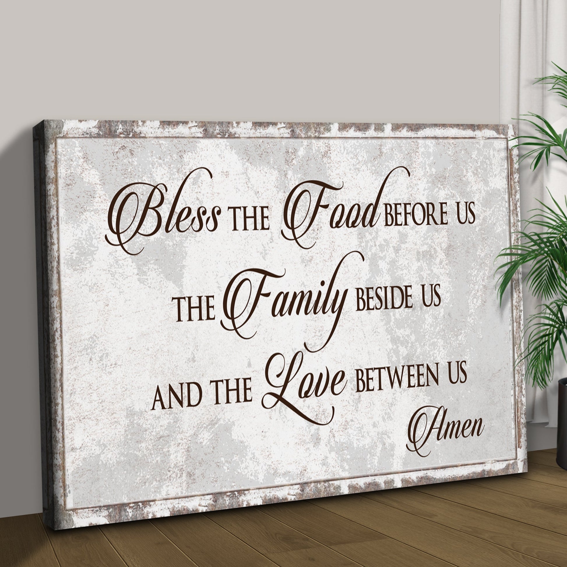Canvas sign Bless Our Food, Family, And Love by Tailored Canvases with rustic white backdrop on Tampa Home & Garden Store