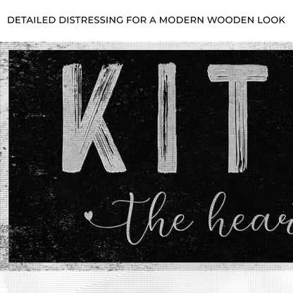 Canvas sign Kitchen Is The Heart Of The Home III with distressed black backdrop and white script on Tampa Home & Garden Store