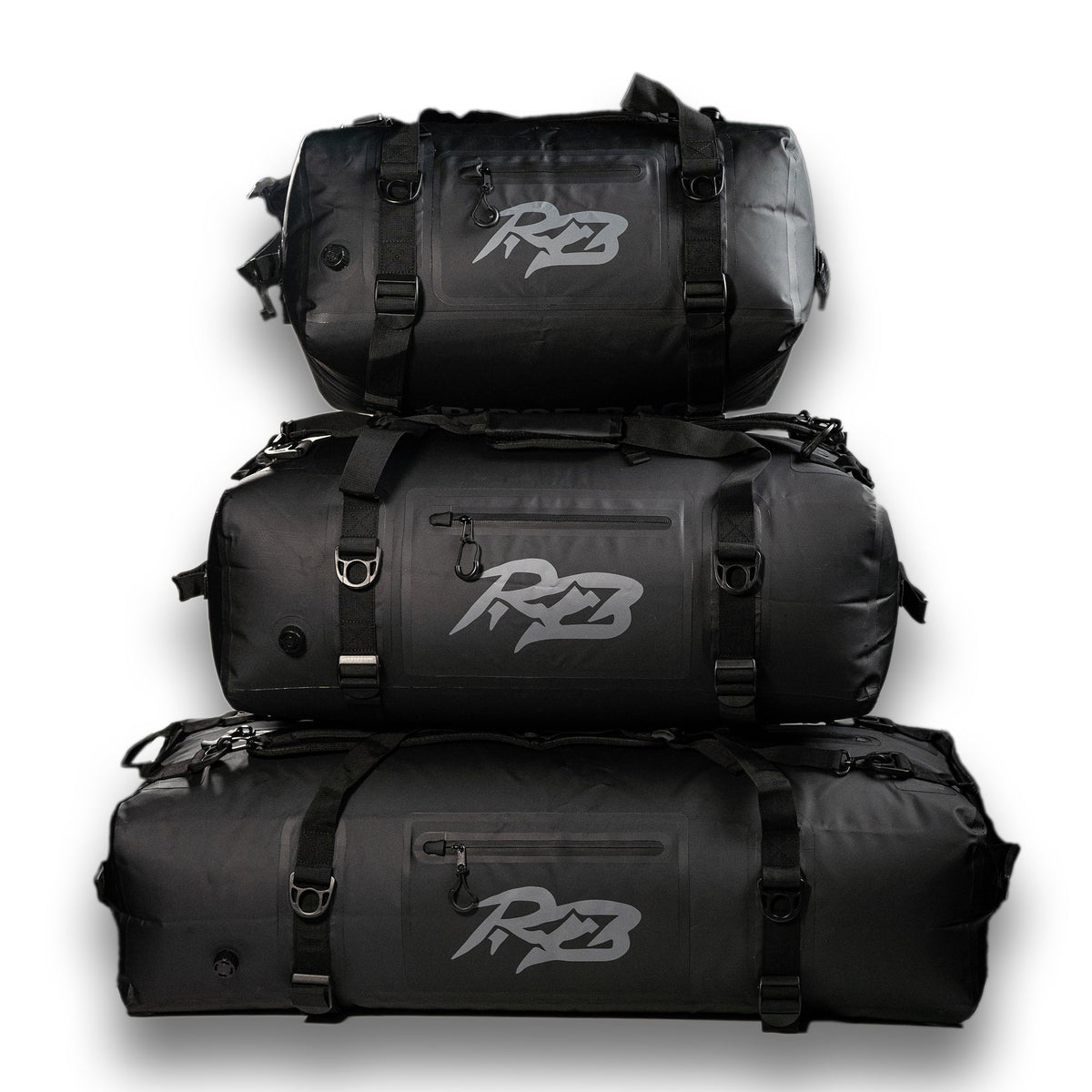 Ridge Bag | Outdoor Duffel Three Pack stacked black duffels with straps and Ridge logo on Tampa Home & Garden Store