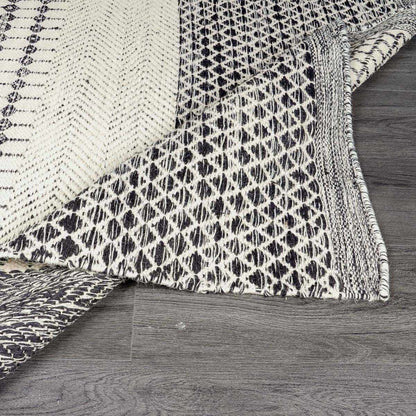Tideswell Scandi Boho Wool Carpet rug in black ivory woven wool by Boutique Rugs on Tampa Home & Garden Store
