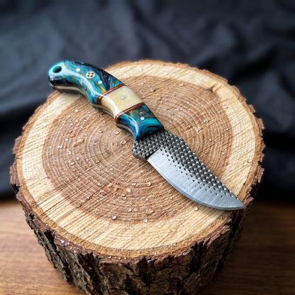 Titan Lagoon Swirl resin skinner fixed blade knife with teal handle and rasp steel blade on Tampa Home & Garden Store