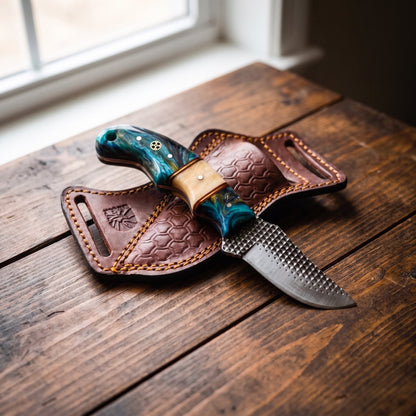 Titan Lagoon Swirl resin skinner with teal handle and high carbon RASP blade in leather sheath on Tampa Home & Garden Store