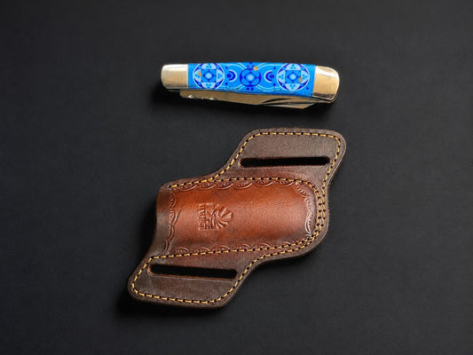 Titan Zellige Tile folding knife with turquoise mosaic resin handle and belt sheath on Tampa Home & Garden Store