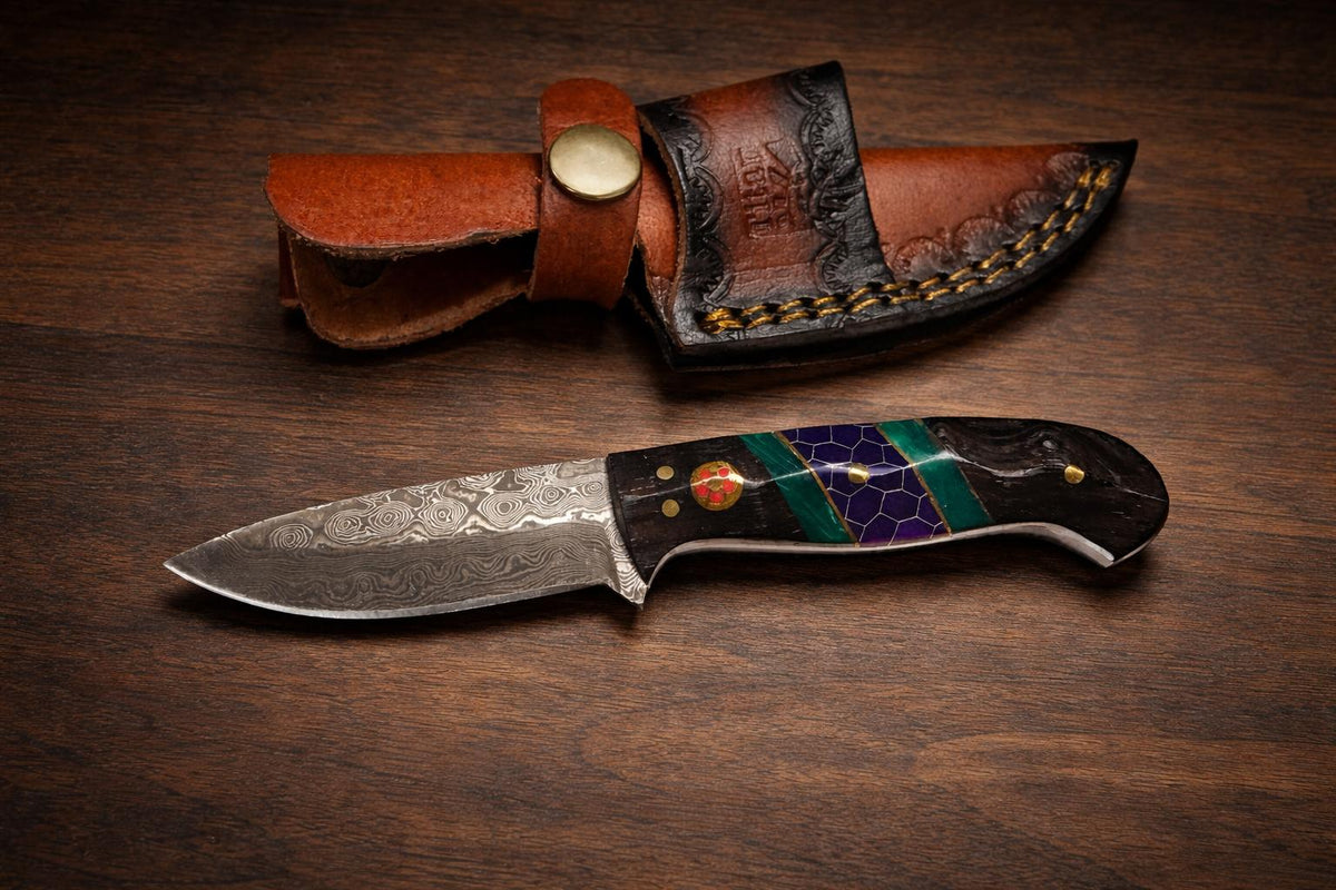 Hand-forged Damascus drop point knife with dark wood and purple honeycomb handle on Tampa Home & Garden Store