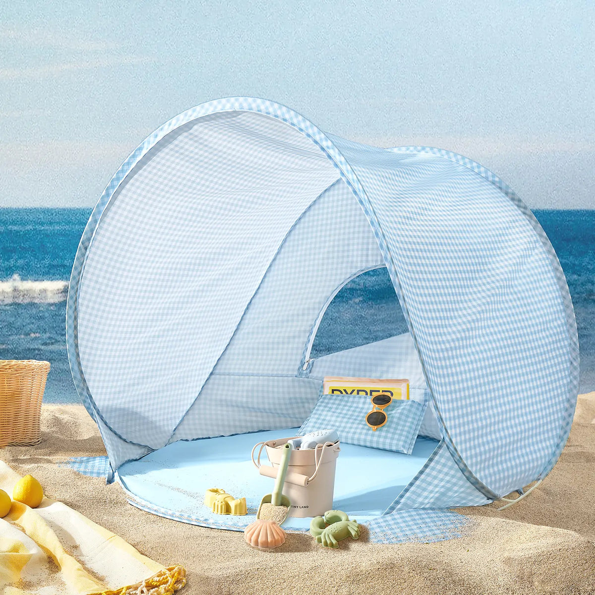Tiny Land One-Stop Beach Toy & Tent Set beach tent blue gingham pop-up on sandy beach on Tampa Home & Garden Store
