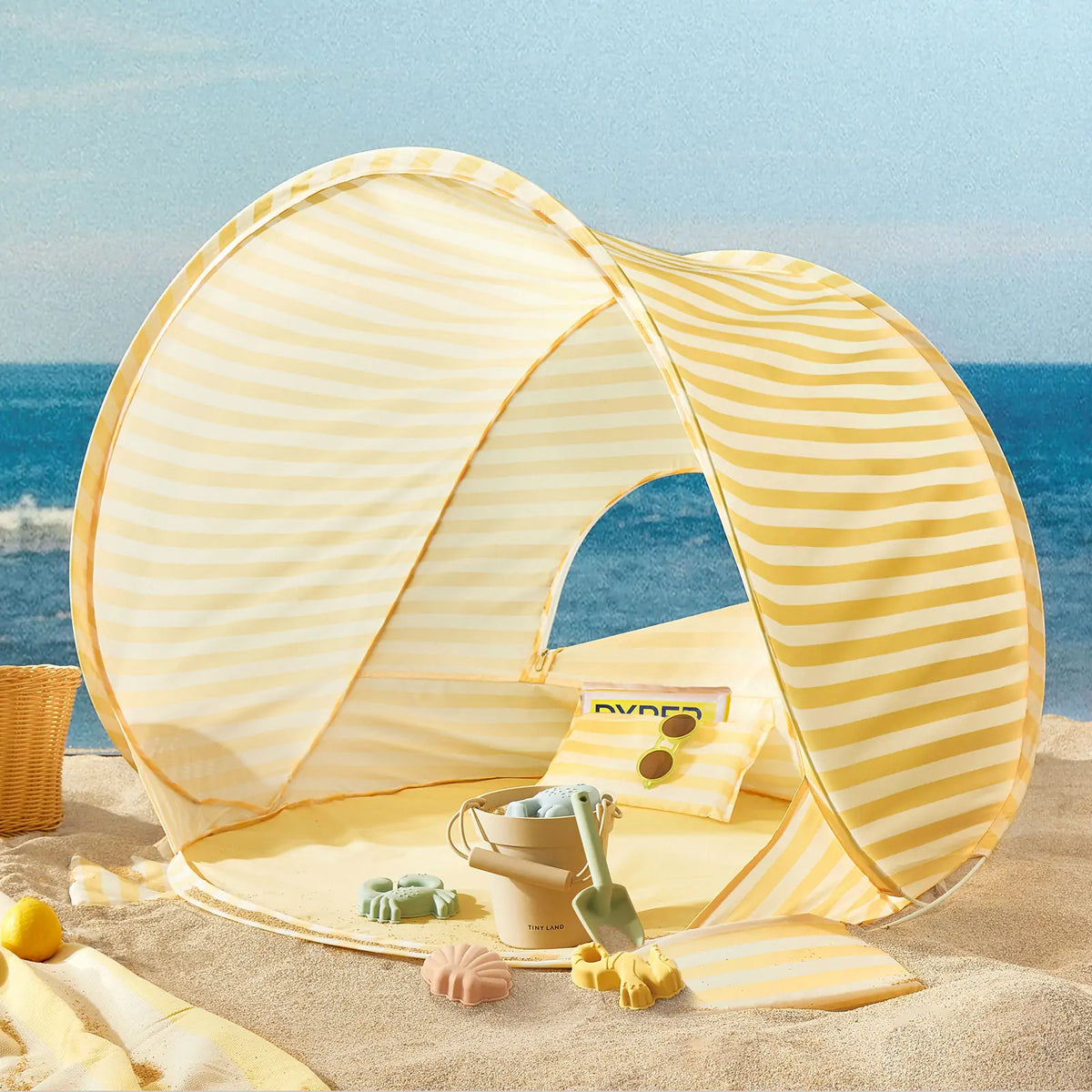 Tiny Land One-Stop Beach Toy & Tent Set yellow striped pop-up beach tent with sand toys on beach on Tampa Home & Garden Store