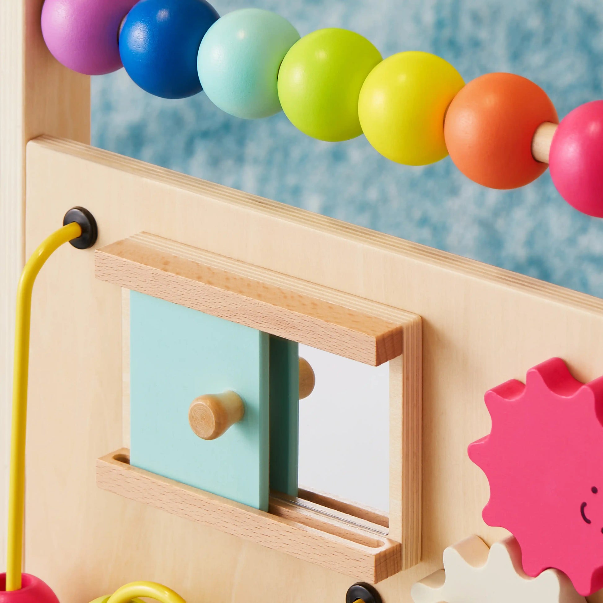 Tiny Land Premium Natural Wooden Activity Walker with colorful beads along a string on Tampa Home & Garden Store