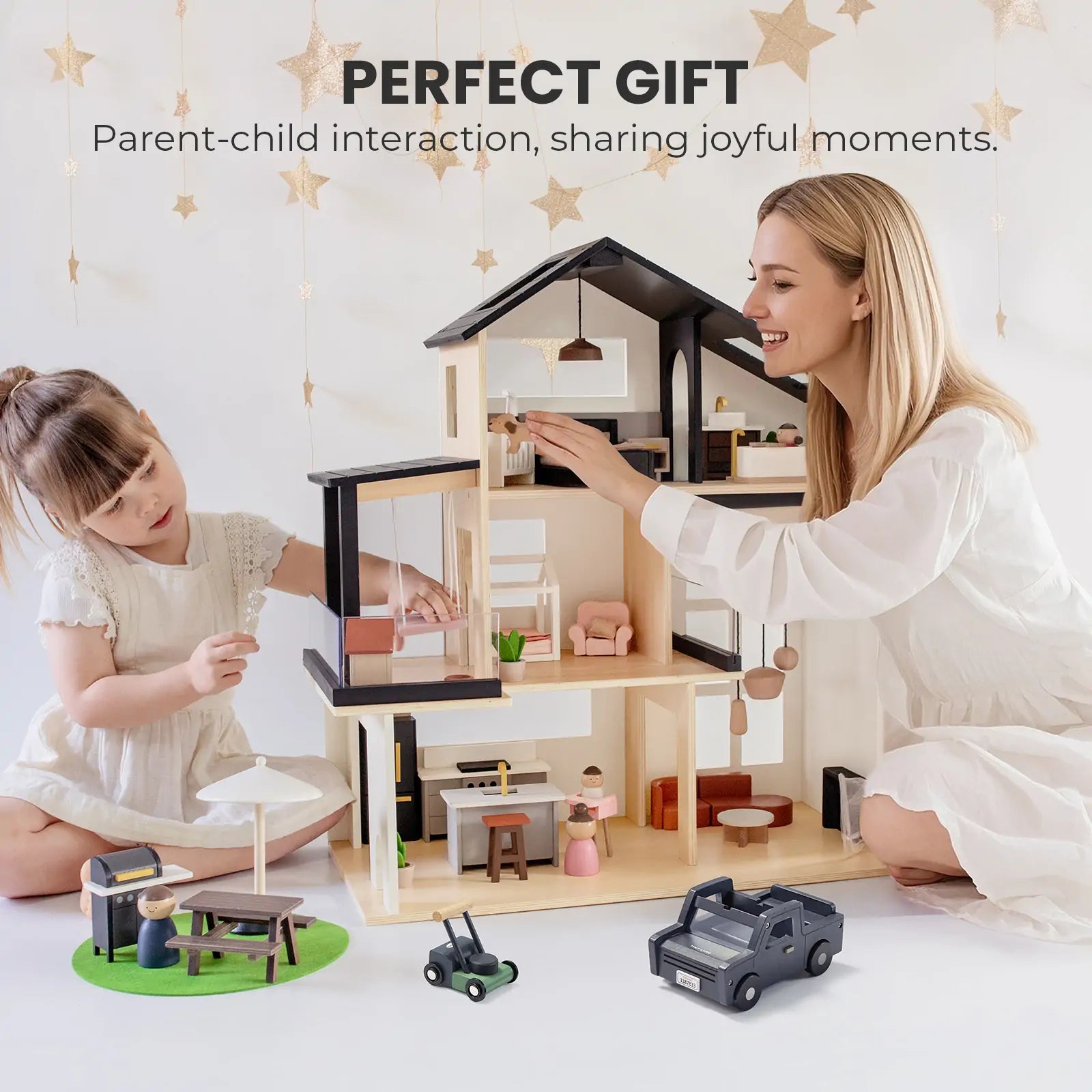 Black dollhouse playset with garage, Tiny Land INC, includes extra dolls on Tampa Home & Garden Store