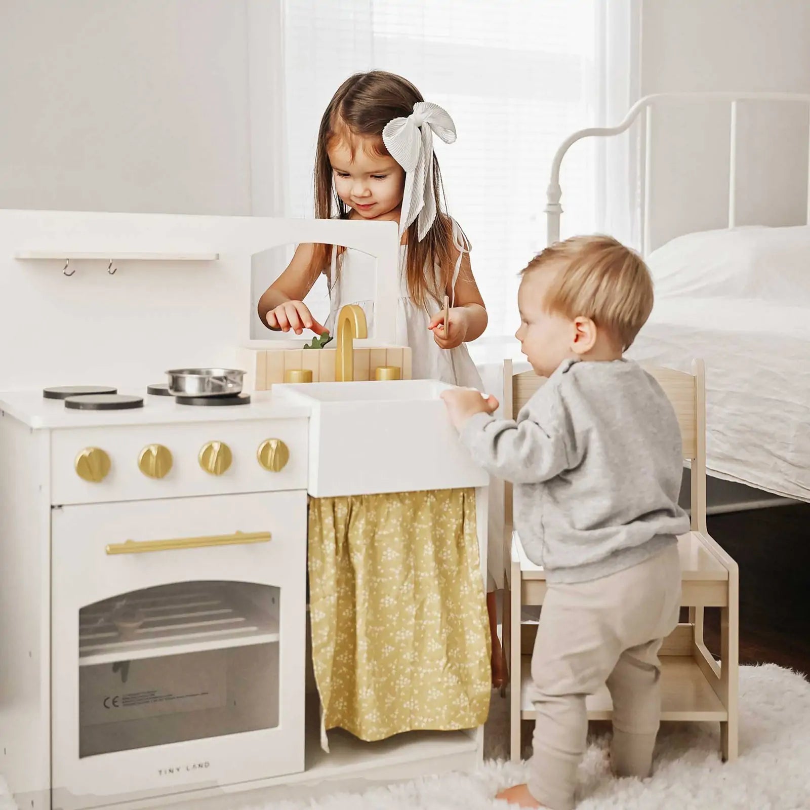 Tiny Land wooden play kitchen Honey Kitchenette for toddlers with gold knobs kids playing on Tampa Home & Garden Store