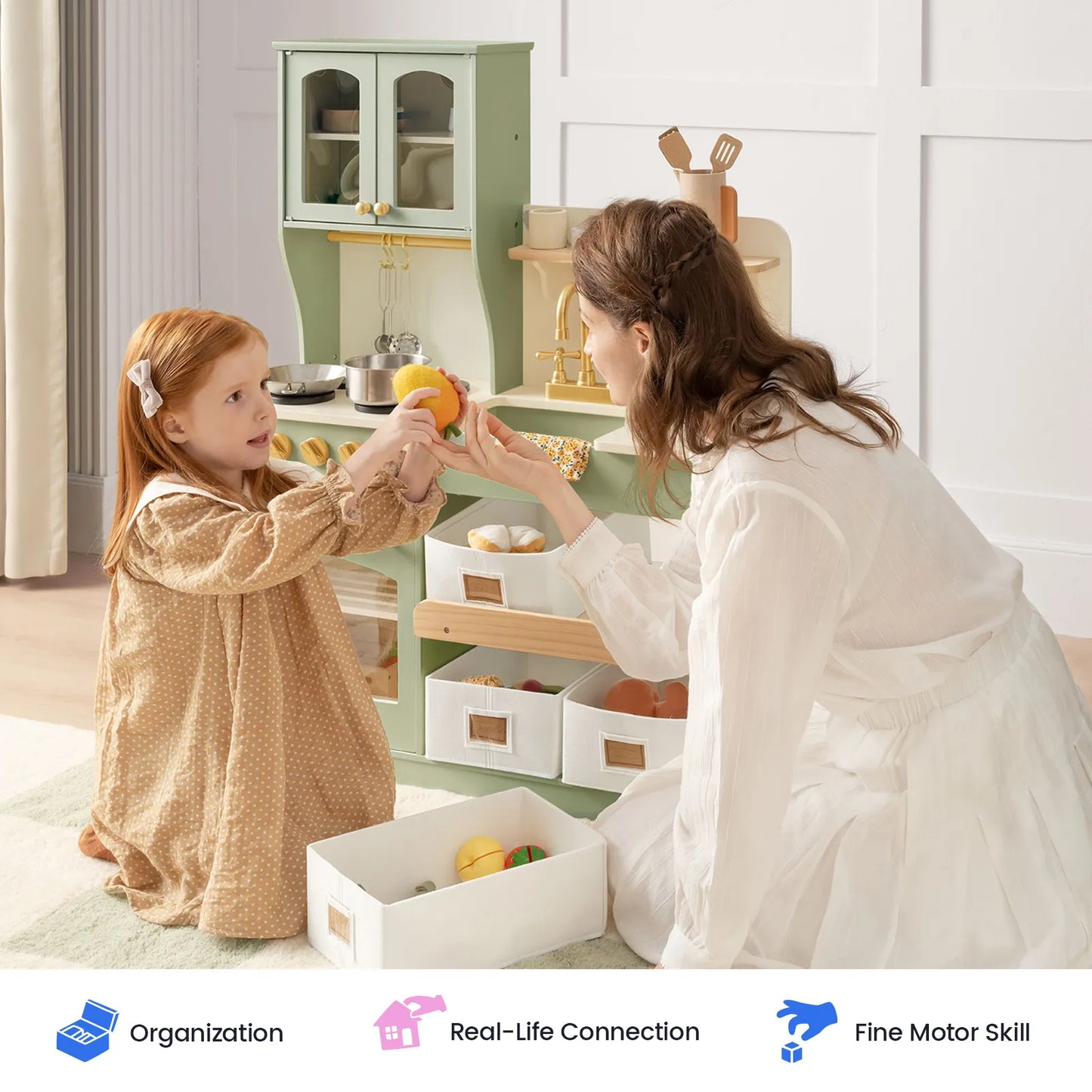 Tiny Land INC wooden play kitchen with storage in pastel green, child and mother playing on Tampa Home & Garden Store