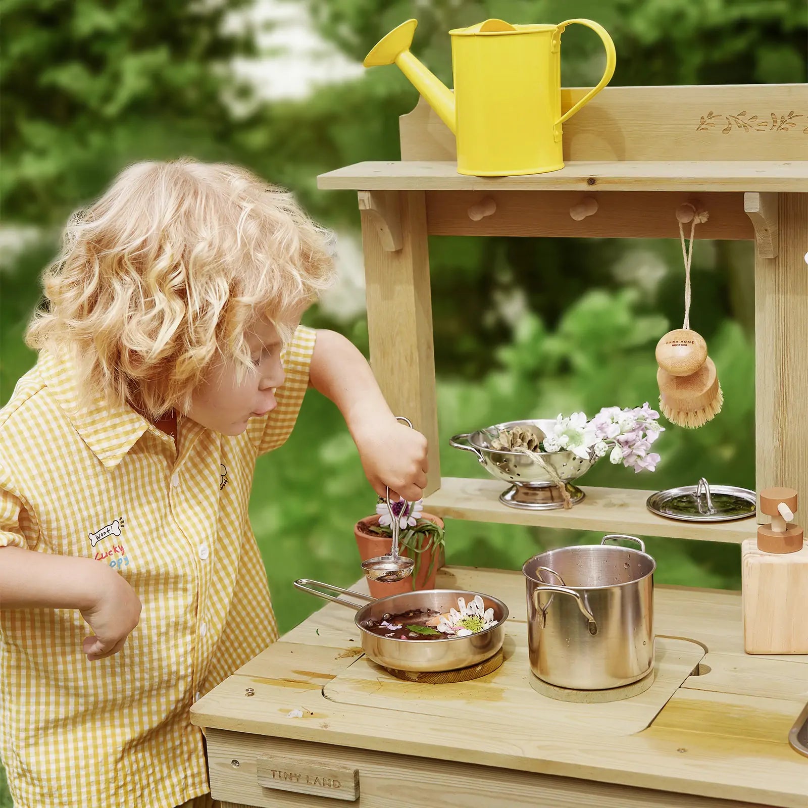 Tiny Land Mud Kitchen DuoPlay outdoor play kitchen for kids with yellow watering can on Tampa Home & Garden Store