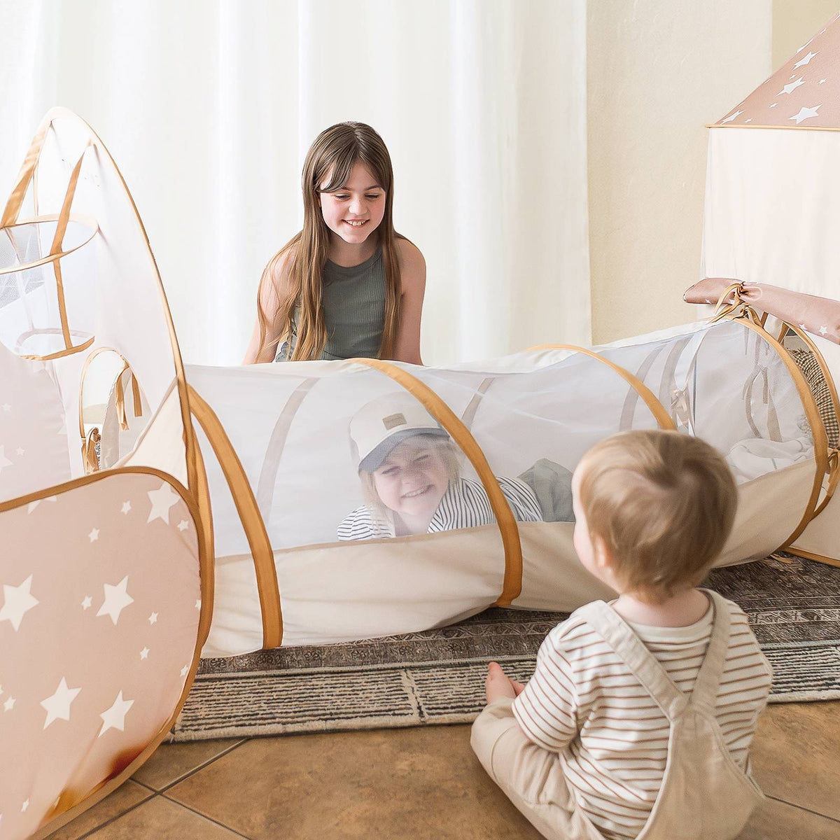 Tiny Land Compact Adventure 3-in-1 Play Tunnel pink star-pattern tunnel with mesh panels on Tampa Home & Garden Store
