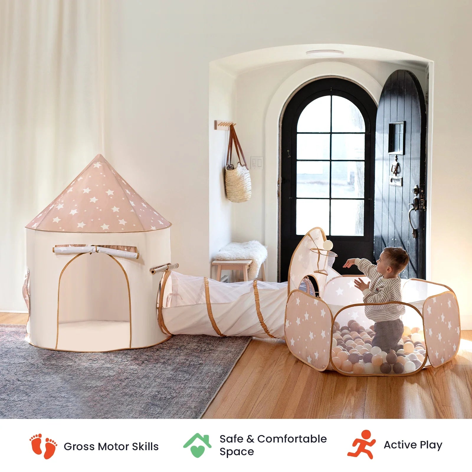 Tiny Land Compact Adventure 3-in-1 Play Tunnel pink star-pattern tent in a bright playroom on Tampa Home & Garden Store