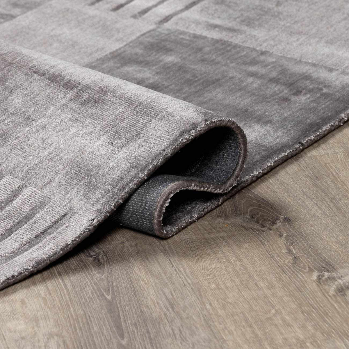 Tjode Hand Loomed Area Rug gray tones rolled edge detail Boutique Rugs on Tampa Home & Garden Store
