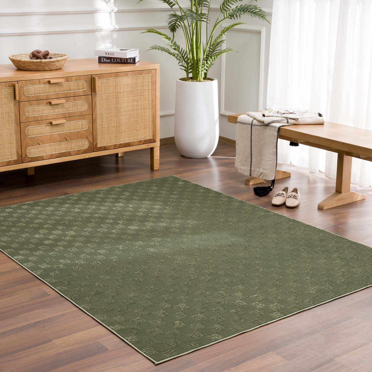 Truls 3D Checkered Washable Rug Green on dark wood floor in a modern living room on Tampa Home & Garden Store
