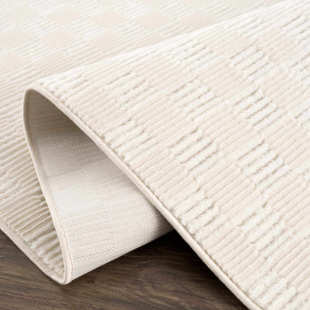 Truls 3D Checkered Washable Rug Bone cream ribbed pile, underside visible Boutique Rugs on Tampa Home & Garden Store