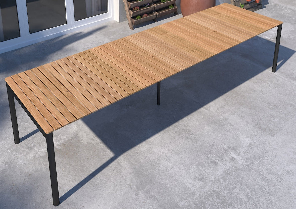 Topaz dark teak and aluminum rectangular extendable outdoor table with black legs on Tampa Home & Garden Store