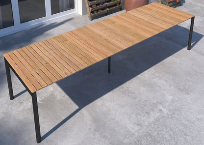 Topaz dark teak and aluminum rectangular extendable outdoor table with black legs on Tampa Home & Garden Store