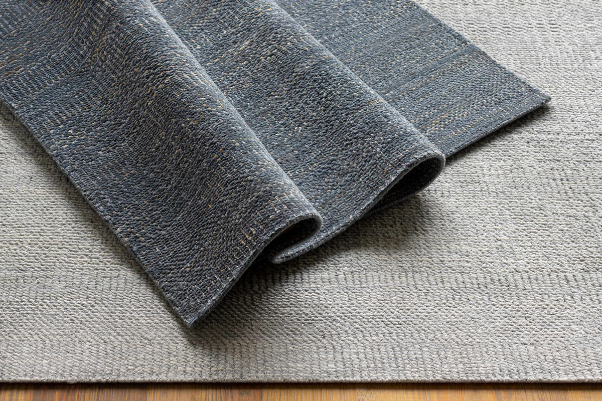 Ocate gray wool area rug by Boutique Rugs, textured gray loop pile on Tampa Home & Garden Store