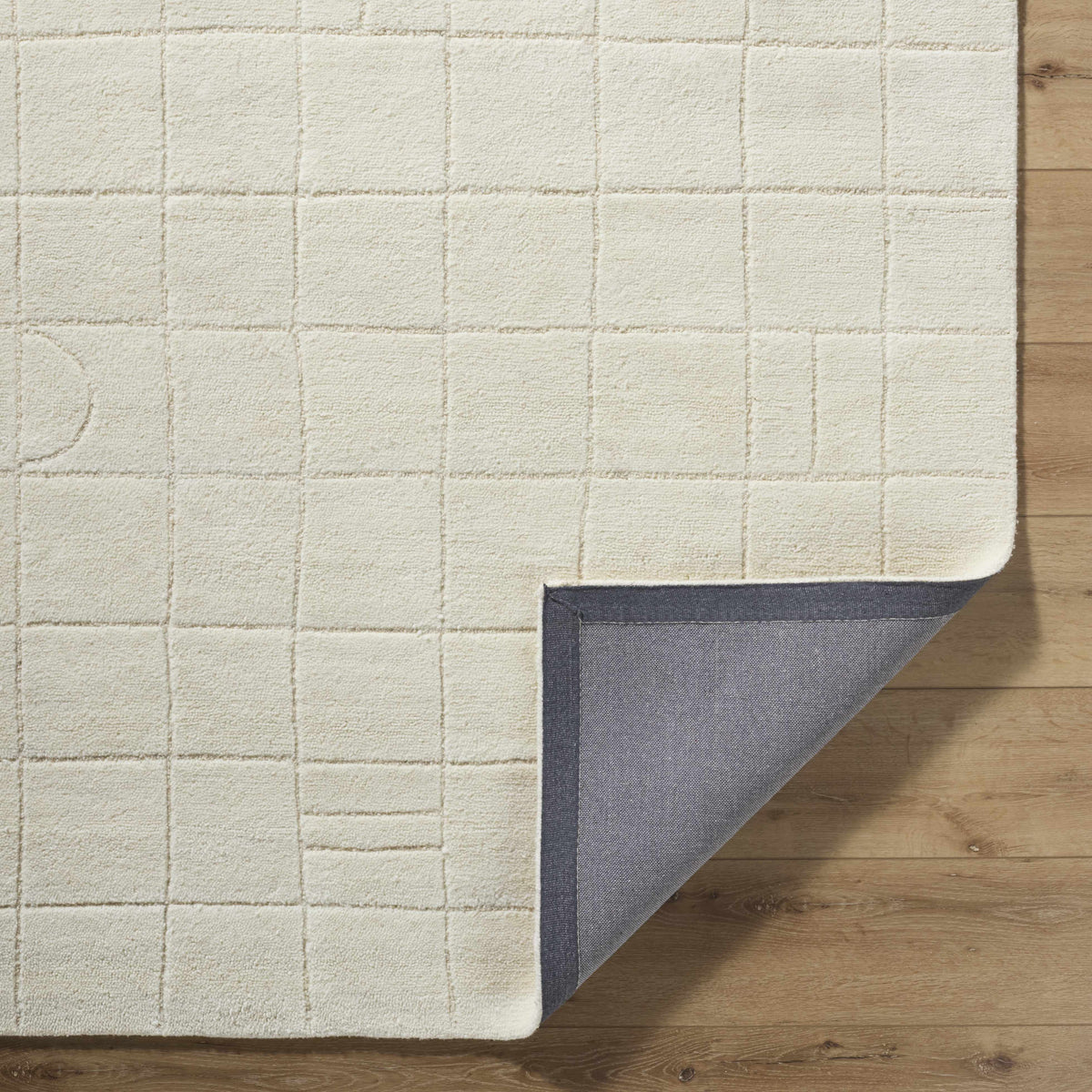 Tuuka Silver Beige Area Rug by Boutique Rugs, cream grid-pattern, plush tufted texture on Tampa Home & Garden Store