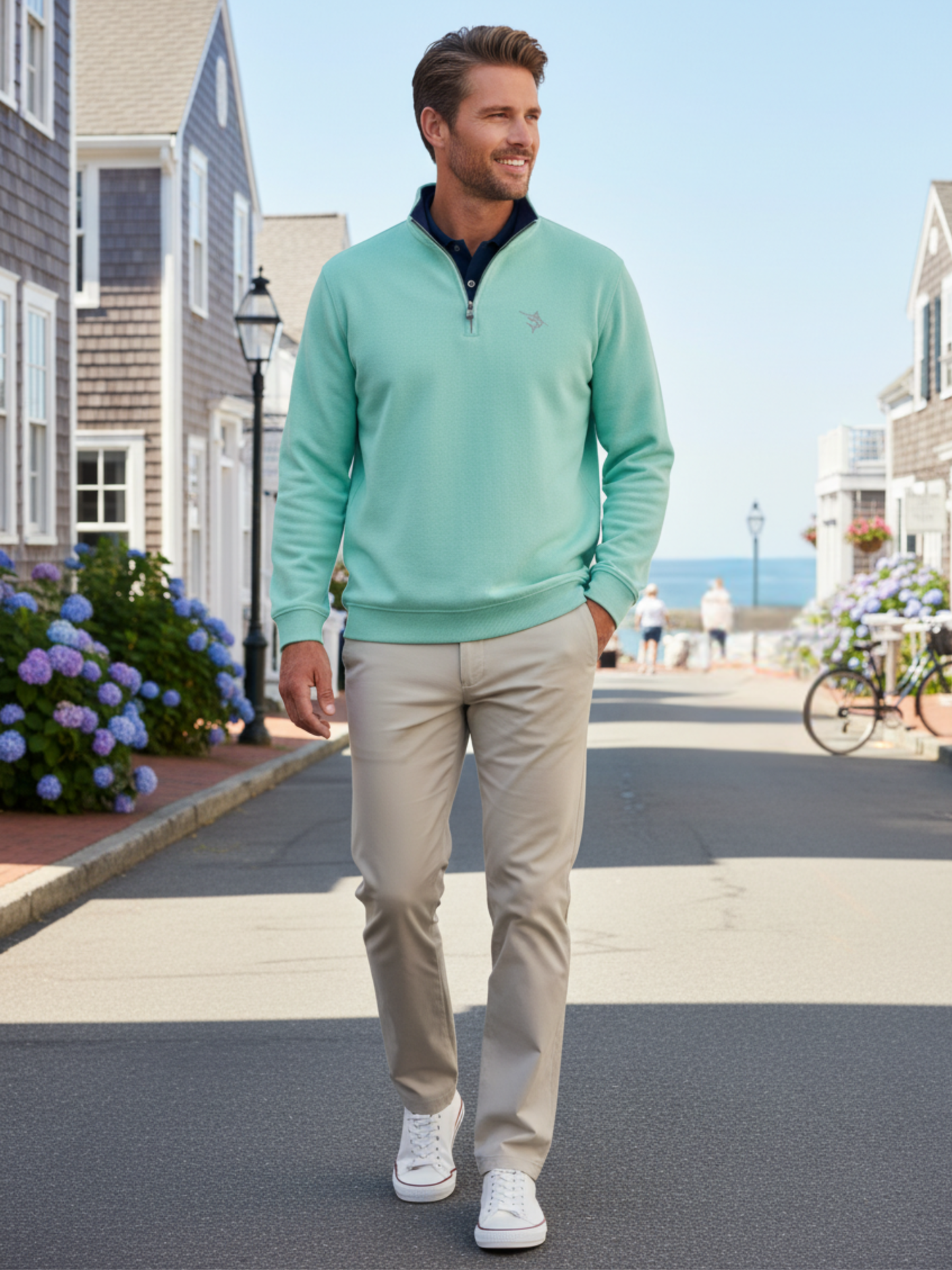 Turnberry Quarter Zip Smooth Knit mint green knit White Water Life worn by man on street on Tampa Home & Garden Store