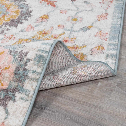 Twilight Floral Area Rug by Boutique Rugs, pastel floral print with ivory and teal binding on Tampa Home & Garden Store