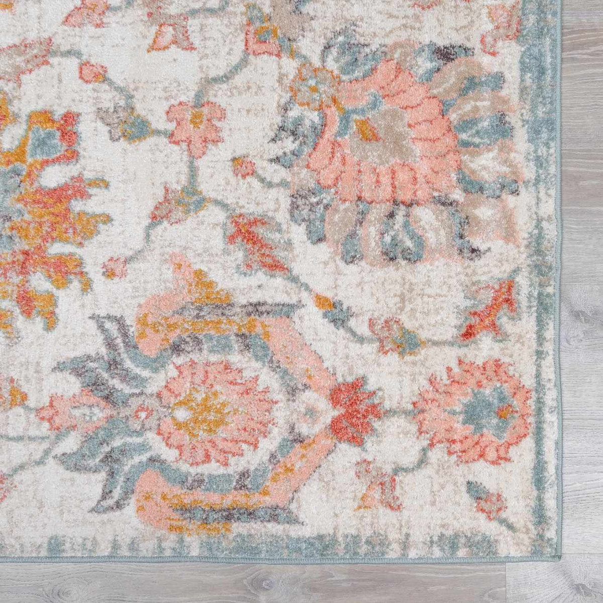 Twilight Floral Area Rug, Boutique Rugs, beige with pink coral florals and blue accents on Tampa Home & Garden Store
