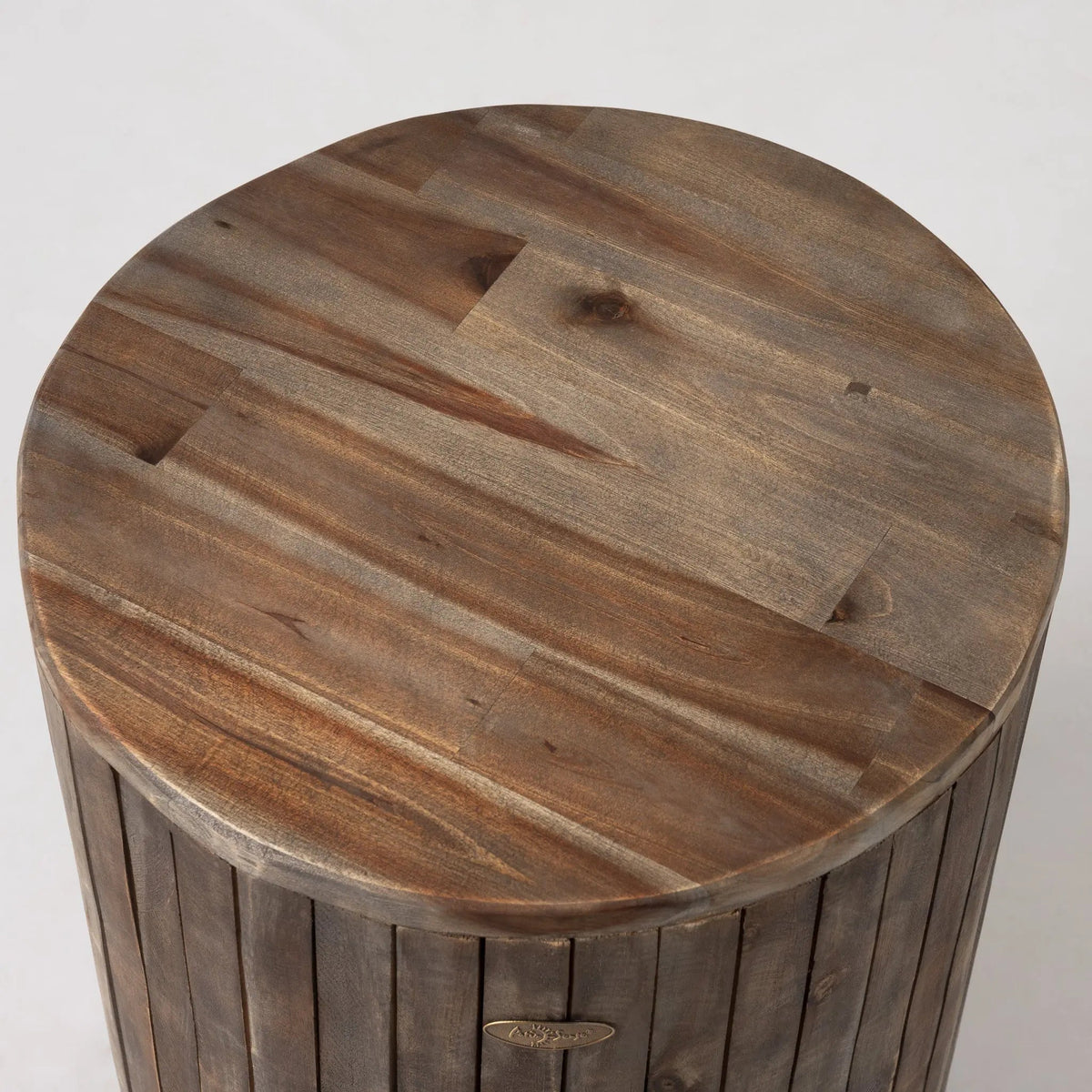 Round wooden garden stool in dark brown finish with visible wood grain on Tampa Home & Garden Store