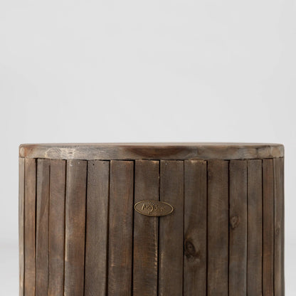 Michael Round Garden Stool, dark brown barrel-style wood with Fire Sense badge on Tampa Home & Garden Store