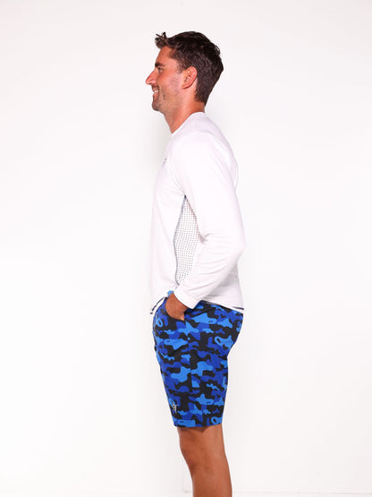 NautiFlex Performance Tee white with mesh side panels; man wearing blue camo shorts on Tampa Home & Garden Store