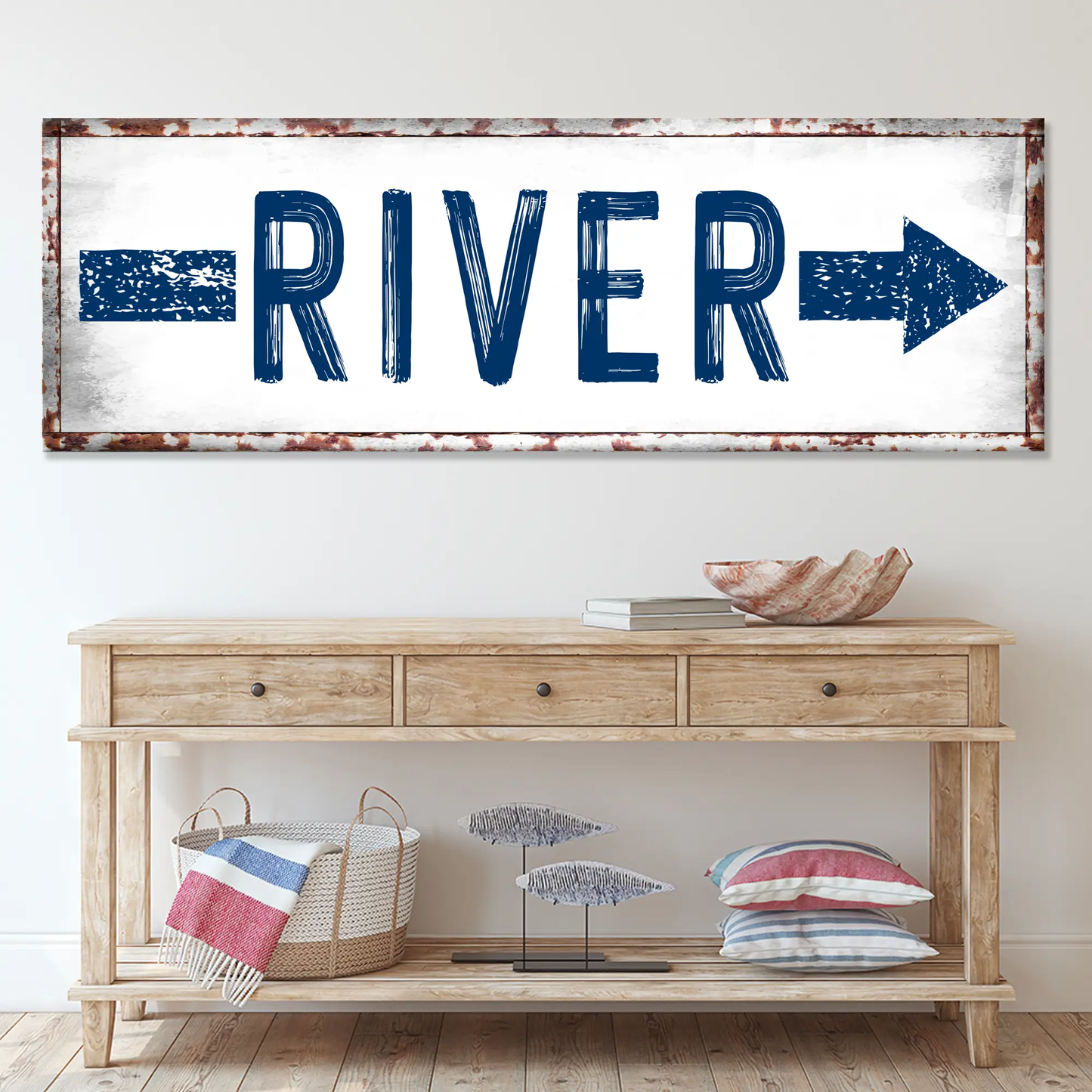 Canvas River Arrow Sign by Tailored Canvases, blue bold lettering with rustic rust frame on Tampa Home & Garden Store