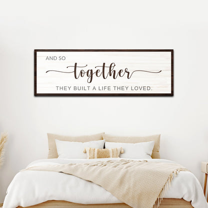Canvas sign And So Together They Built A Life They Loved by Tailored Canvases on white wood with dark frame on Tampa Home & Garden Store