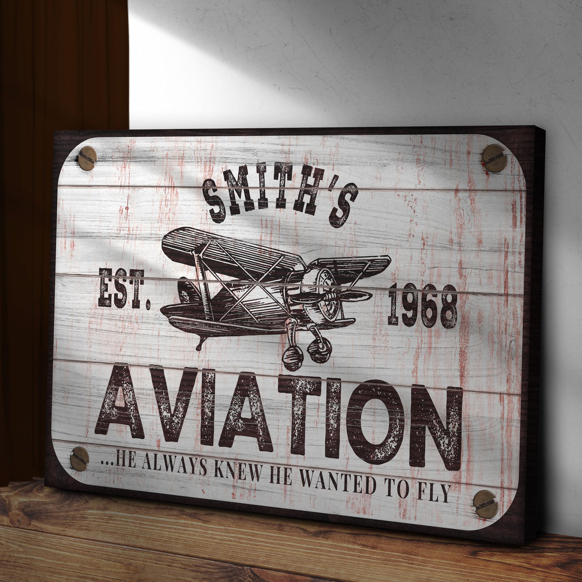 Canvas aviation sign He Always Knew He Wanted To Fly with white wood and vintage airplane on Tampa Home & Garden Store