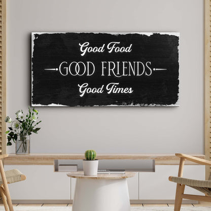 Canvas sign with white scripted Good Food Good Friends Good Times on distressed black canvas on Tampa Home & Garden Store