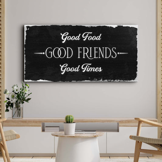 Canvas sign with white scripted Good Food Good Friends Good Times on distressed black canvas on Tampa Home & Garden Store