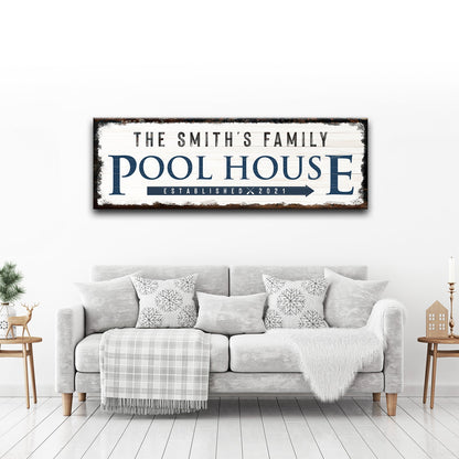 Family pool house sign canvas wall art with distressed white wood background and blue letters on Tampa Home & Garden Store