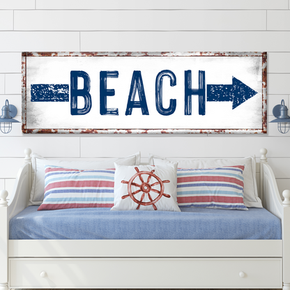 Beach Arrow Sign canvas artwork with navy lettering and rusted frame by Tailored Canvases on Tampa Home & Garden Store