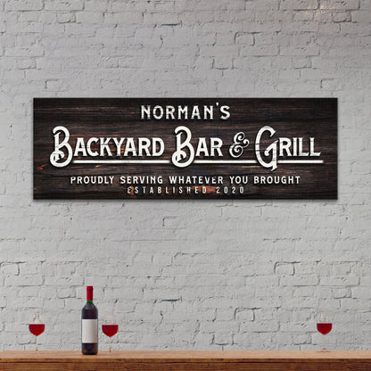 Backyard Bar & Grill Sign II canvas by Tailored Canvases on dark wood background on Tampa Home & Garden Store