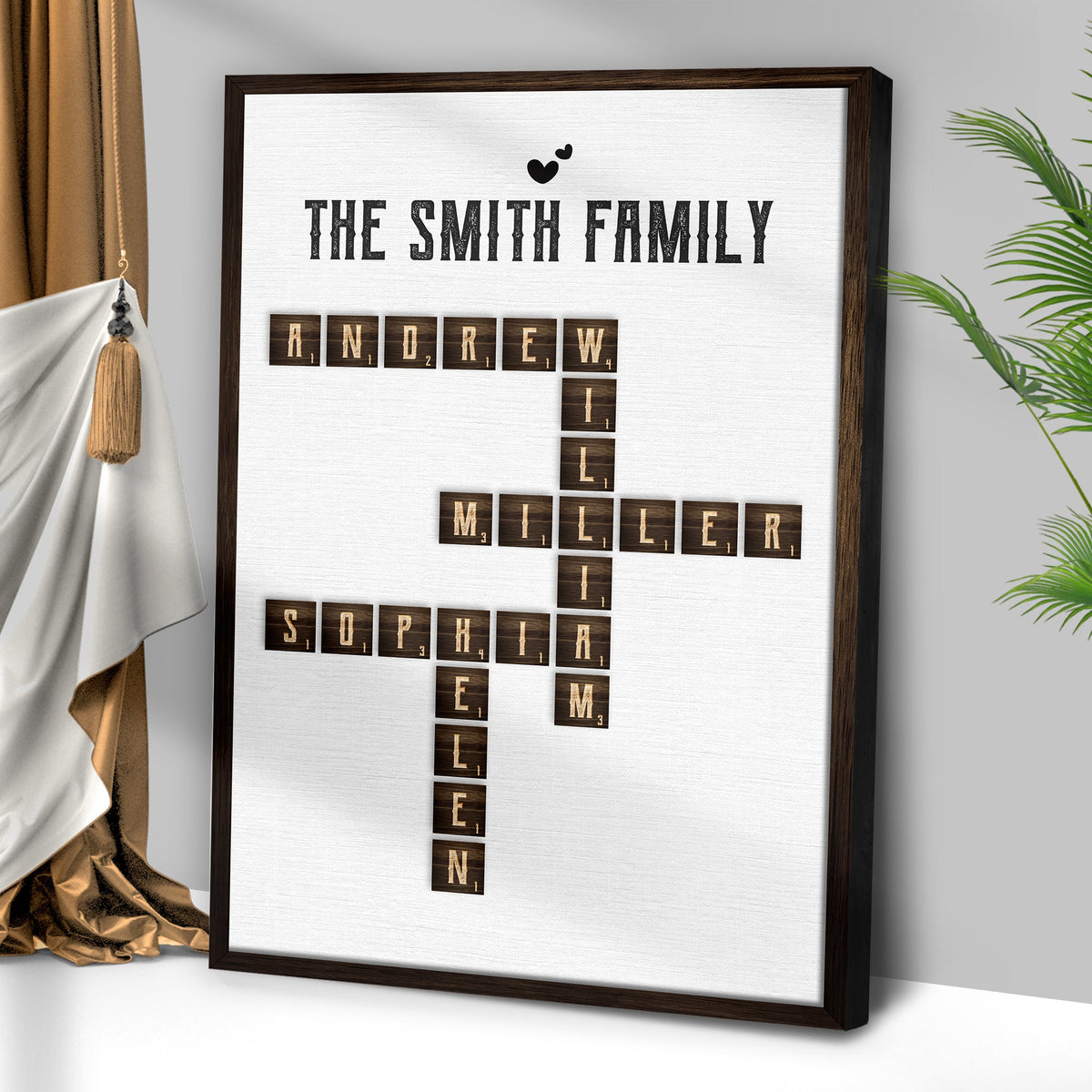 Scrabble family name sign canvas with wood frame displaying THE SMITH FAMILY and ANDREW MILLER on Tampa Home & Garden Store