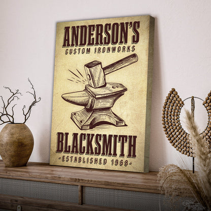 Canvas sign beige with Anderson's Custom Ironworks and a vintage anvil hammer illustration on Tampa Home & Garden Store