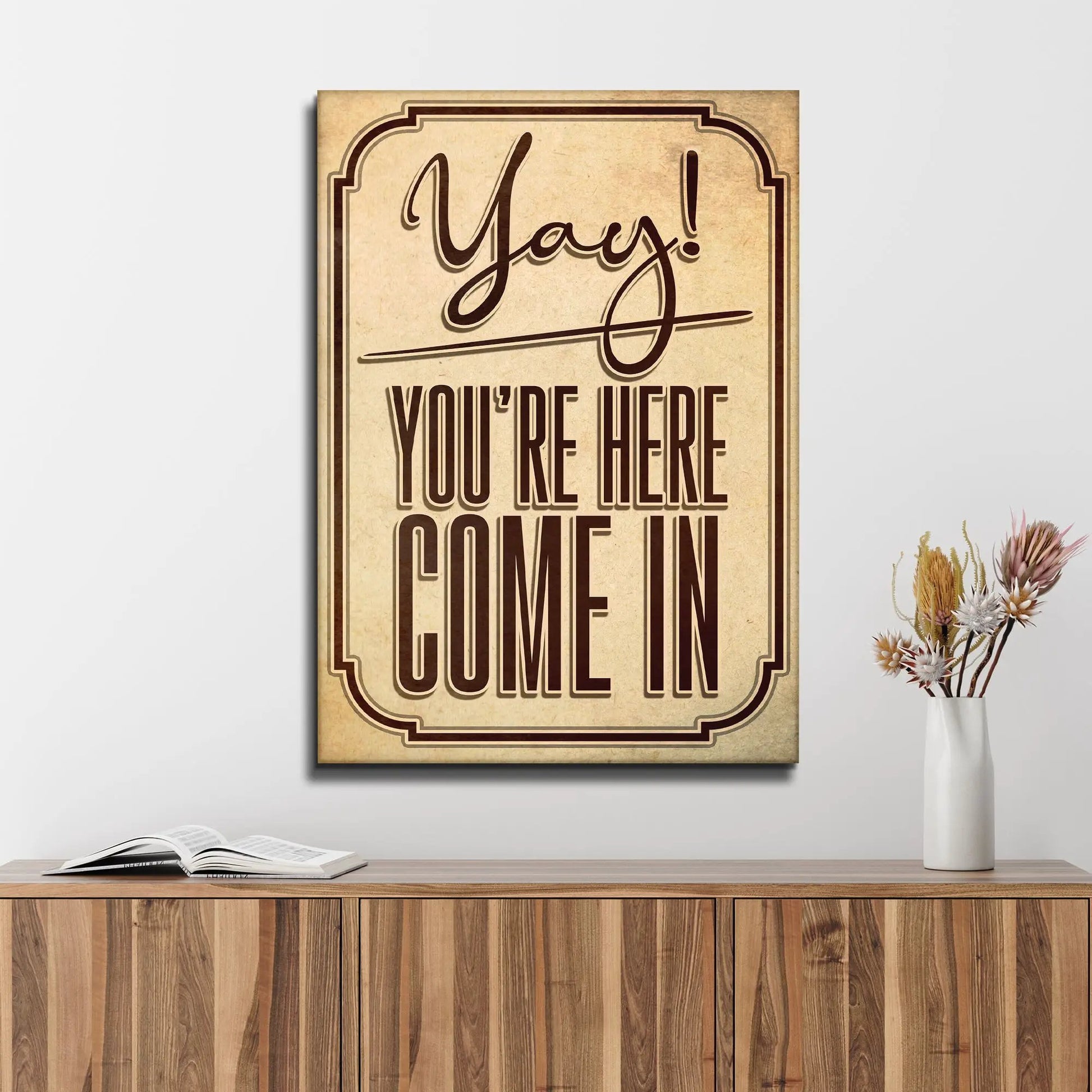 Canvas entryway sign vintage beige with brown border displaying Yay! You're Here Come In on Tampa Home & Garden Store