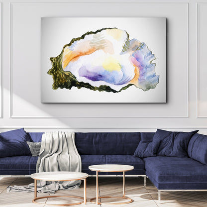 Oyster Watercolor Canvas Wall Art with pastel shell hues, shown above navy sofa on Tampa Home & Garden Store
