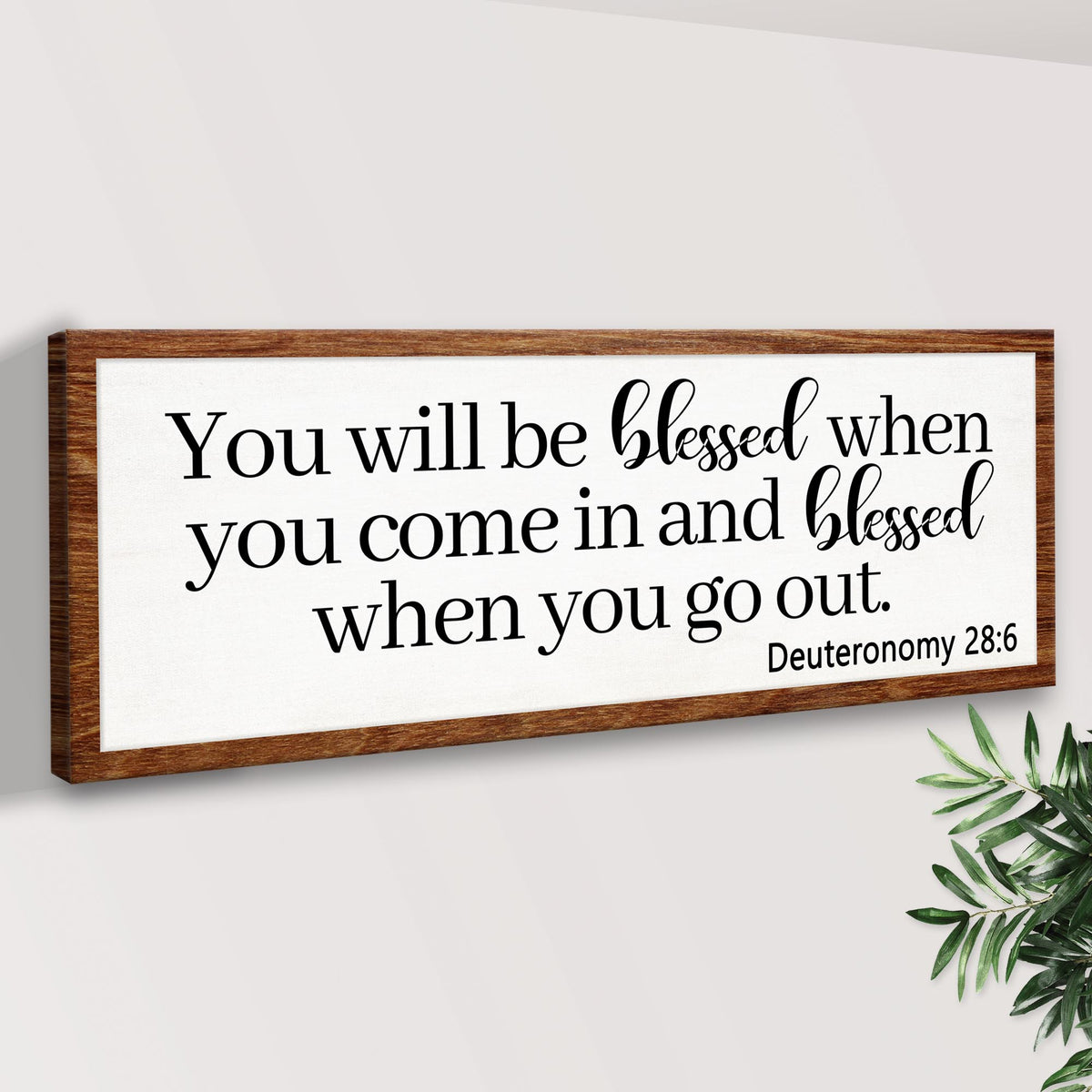 Canvas sign by Tailored Canvases with black script Deuteronomy 28:6 on Tampa Home & Garden Store