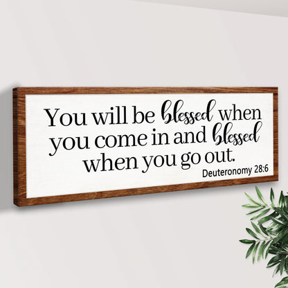 Canvas sign by Tailored Canvases with black script Deuteronomy 28:6 on Tampa Home & Garden Store