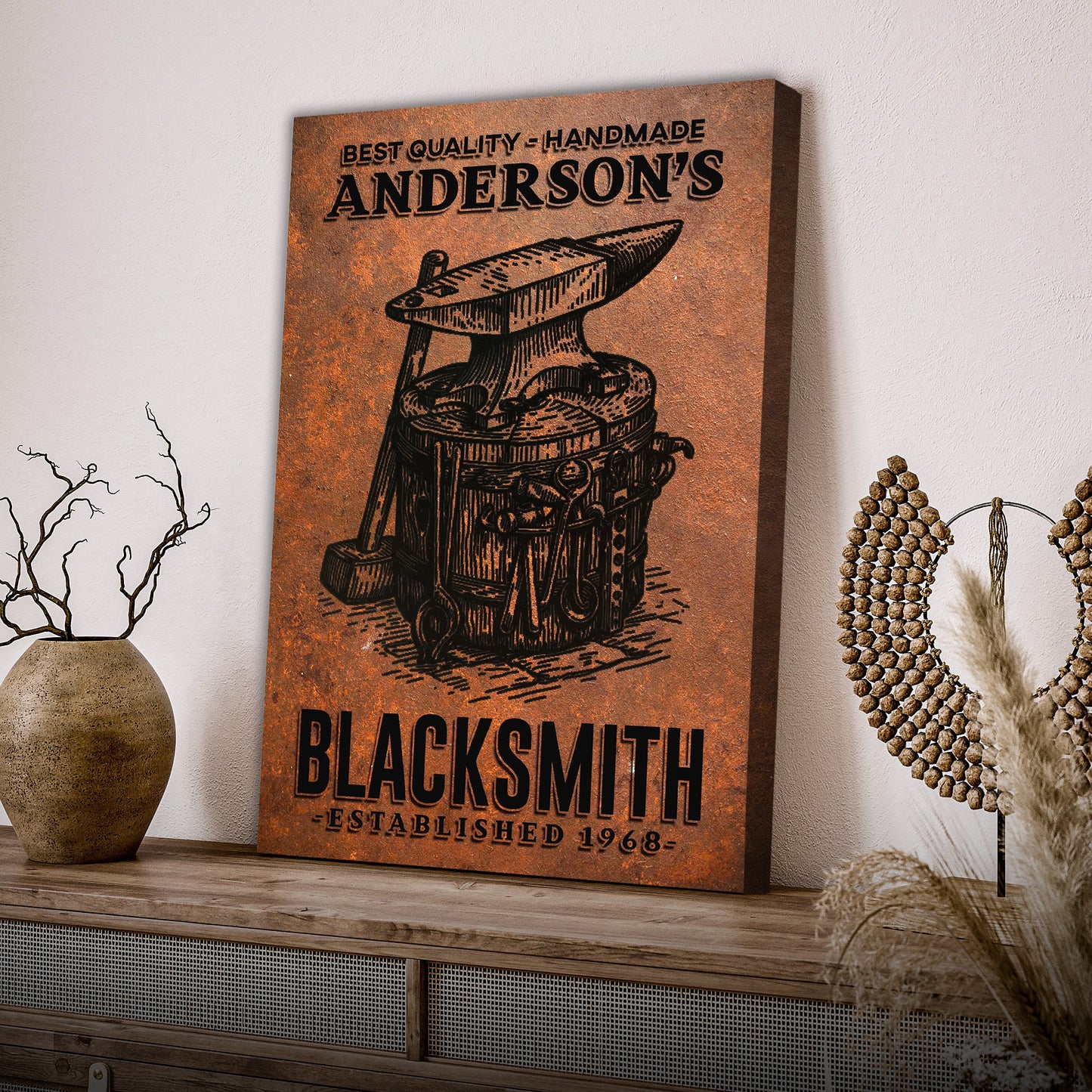 Canvas sign with rusted copper finish and vintage blacksmith motif ANDERSON'S BLACKSMITH text Tailored Canvases on Tampa Home & Garden Store