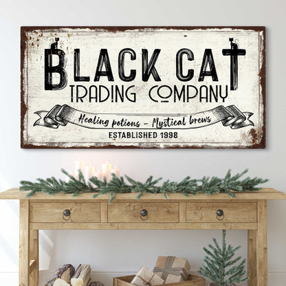 Black Cat Trading Company Sign canvas by Tailored Canvases with distressed white background on Tampa Home & Garden Store