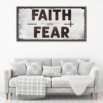 Faith Over Fear motivational sign canvas by Tailored Canvases; white distressed frame above a sofa on Tampa Home & Garden Store
